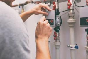 soul plumber installing hot water system in house